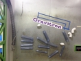 Kidzu’s GRAVITRON engages young visitors’ problem-solving skills as it launches balls with a giant Archimedes screw. Children can arrange tubes or “tracks” and watch balls race through them.